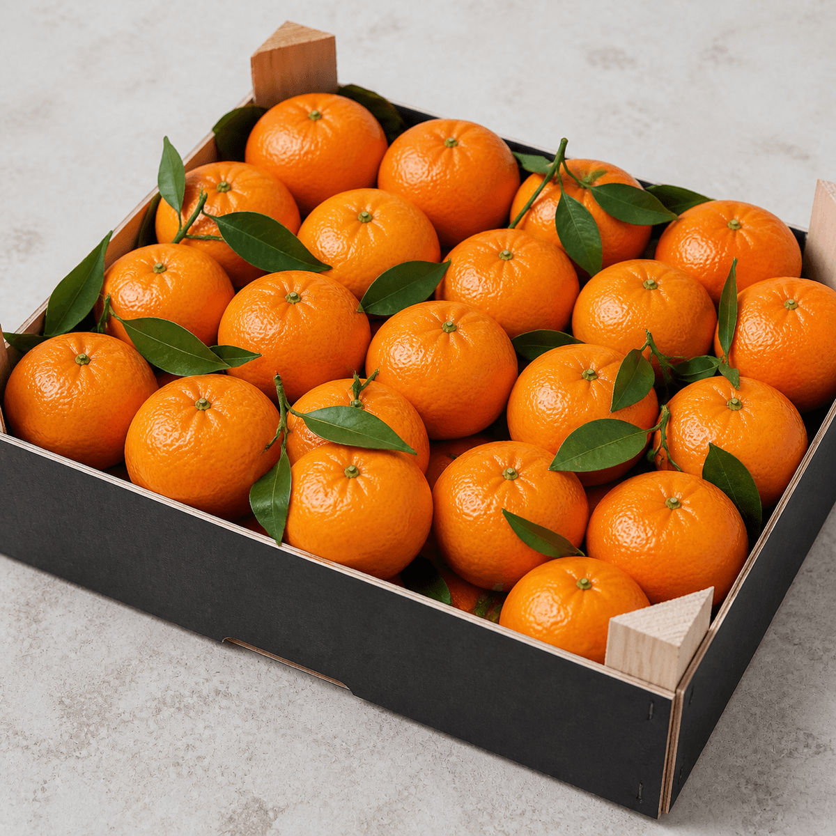 Fresh Spanish mandarins in a produce crate